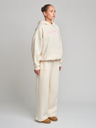 Buttercream trackies, buttercream trackpant, cream trackies, cream and pink trackies, baby pink trackies, comfy trackies, wide leg trackies, flare leg trackies, flare trackies, flare trackpant, flare pants, baby pink flare trackies, tracksuit set, cream tracksuit set, comfy tracksuit set, oversized tracksuit set, baby pink track set, high quality tracksuit set, cream hood, cream and pink hoodie 